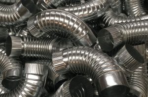 pile of sheet metal pipes